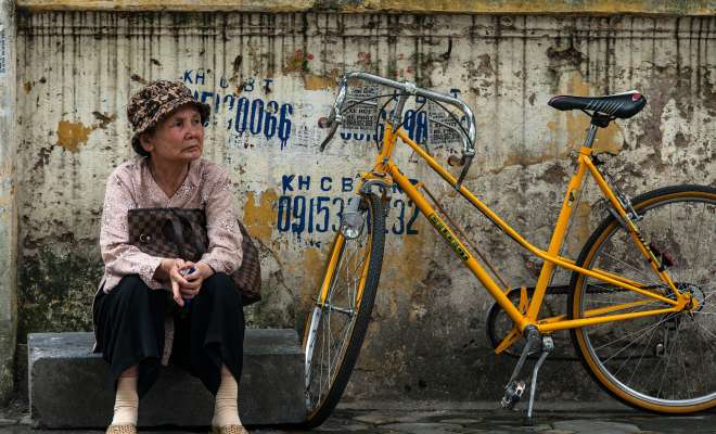 Bicycle and old woman