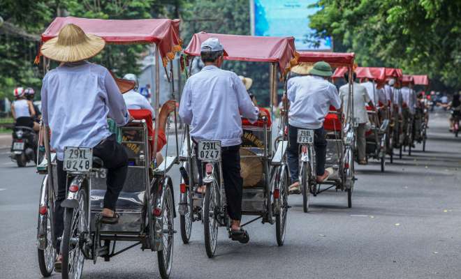 Cyclos on a Vietnam street