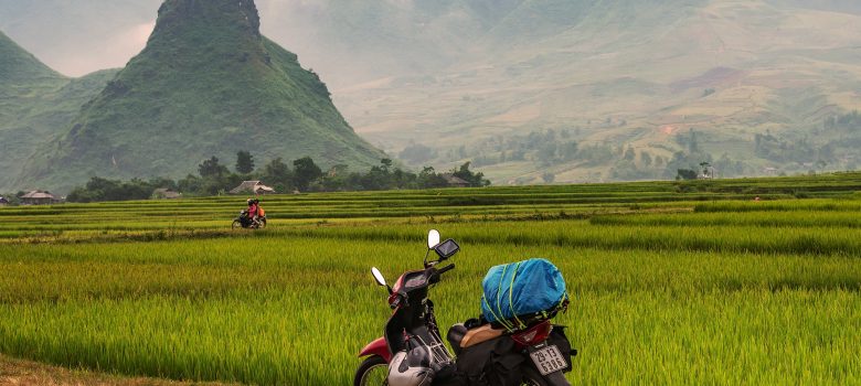 Nghia Lo - motorbike and green rice fields in a hidden mountain valley